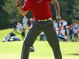 Rory mcilroy reacts to a missed putt. Rory Mcilroy S Style Evolution Golf Digest