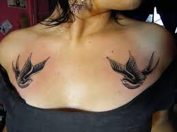 Birds tattoo on upper chest for women. 110 Best Chest Tattoos For Women And Men