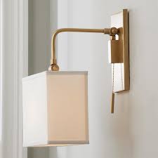 Go with our metal shade for a sophisticated, modern look. Angled Shade Adjustable Arm Wall Sconce Sconces Wall Sconces Swing Arm Wall Sconce