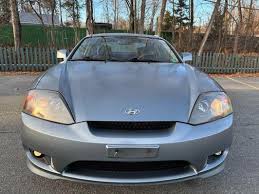 Image result for Triton Green 2004 Tiburon