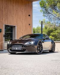 Image result for Marron Black 2017 Aston Martin