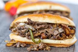Remove the peppers and onions to a bowl, turn the heat to medium high, then add the mushrooms. Easy Philly Cheesesteak Recipe The Ultimate Guide Momsdish