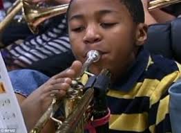 Amazing: 10-year-old born without arms, still masters trumpet