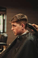Maybe you would like to learn more about one of these? Young Man In Salon For Haircut Stockphoto