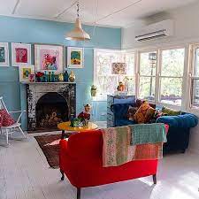 Nothing Like A Shoot In Your Home To Get Some Tidying Up Done Red Sofa Living Room Living Room Turquoise Living Room Red