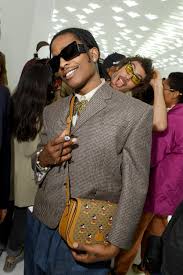 In similar asap rocky style, the professional footballer recently debuted a mani which featured individually designed nails, including the belgium flag, the batman symbol, black and white slime. A Fashionable Look At Hip Hop S Best Dressed Man Asap Rocky Goodtimes Lifestyle Food Travel Fashion Weddings Bollywood Tech Videos Photos