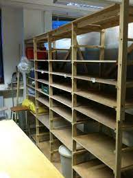 Studio Shelves With Adjustable Shelving Slots Fun Project For Tom Pottery Studio Pottery Workshop Ceramic Studio