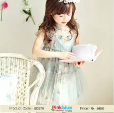 Paired with sequins red raw silk blouse. Elegant Net Floral Kids Wedding Dress In Pastel Green Color In India