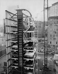 Historic Photographs - A car teeters at the top of a paternoster parking  elevator as a result of a broken bolt in Denver, Colorado, 1970s. More  photos: https://bit.ly/3RcHF0m | Facebook