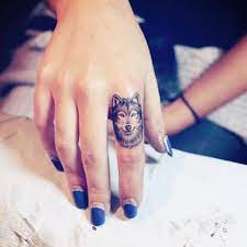 30 Awesome Finger Tattoos That Will Subtly Add Creativity To Your Life Finger Tattoos Wolf Finger Tattoo Tattoos