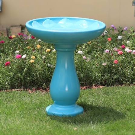 glossy painted bird bath