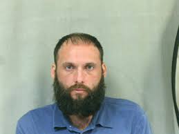 Grand jury returns murder, child neglect indictments