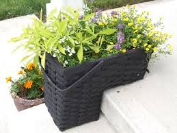 I Made This Planter Out Of A Stair Step Basket I Was Going To Throw Away I Sprayed It Black Lined It With Some Plas Stair Basket Outdoor Stairs Green Basket