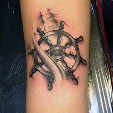 Madagascar penguins 89, mario 129, men in black 33, mickey. 70 Ship Wheel Tattoo Designs For Men A Meaningful Voyage