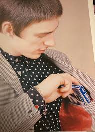 European model shopping for magazines in 1960s London