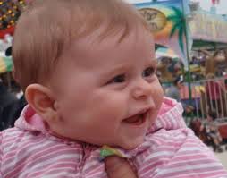 How to make a baby's face look forward in a photo?