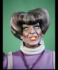 What is Judith doing under the table?