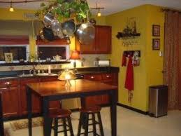 Modern kitchen decors and modern interior kitchen designs here:in the ancient days, we saw the kitchen being used for multi purposes. Lend A Bistro Styled Makeover To Your Kitchen Bistro Kitchen Eclectic Kitchen Design Eclectic Kitchen