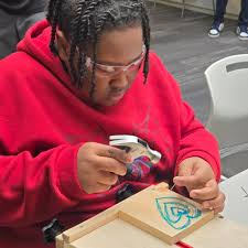 📢 Hands-On Learning in Action! 🛠️🎭🎨 Armstrong Elementary and Middle  School students had an incredible opportunity to participate in a hands-on  woodworking demonstration thanks to Carpenter Contractor Trust, Maple  Woodshop, and the