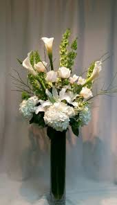 This artificial design features several white hydrangeas mixed with some greeneries in a tall square glass vase. Casa Blanca In San Diego Ca Point Loma Village Florist