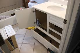 Replacing bathroom vanities requires multiple skillsets, and potentially multiple contractors. How To Turn A Builder Grade Vanity Into A Custom And Chic Piece