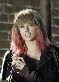 Taylor swift debuts two unexpected hair colors in her new music video her light brown hair was styled in a loose braid and her bangs left in her naturally texture. News Entertainment Music Movies Celebrity Taylor Swift Hair Taylor Swift Pink Hair Taylor Swift Style