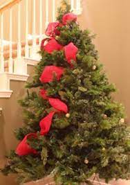 Add Ribbon Garland To Tree By Tying It To The Top And Tucking It Into The Tree In Rando Christmas Tree Ribbon Garland Pencil Christmas Tree Real Christmas Tree