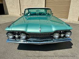 Image result for Mint Green 1930 Oldsmobile