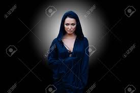 The parts that were brown fade to a grayish color unless i. Young Beautiful Mysterious Woman With A Black Hair And In The Stock Photo Picture And Royalty Free Image Image 112091701