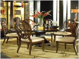 Including four slatted back chairs with slightly curved angles throughout, in a bright colored finish. Bobs Furniture Dining Room Sets Wild Country Fine Arts