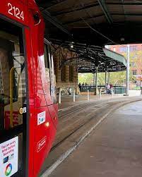 Light Rail To Dulwich Hill Awaiting Departure At Central Station In The Background You Can See The Original Sign To Pit Light Rail Central Station Background