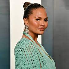 Chrissy teigen is a model and popular social media personality. Chrissy Teigen Celebrates The Messes In Progress With New Tattoo E Online