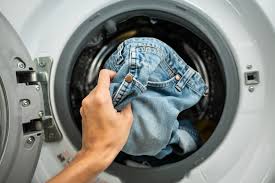 If you wash under a warmer water it will absorb colors (but it certainly can get overwhelmed), and by inspecting it at the end of the wash you will get an idea of how much dye is still being released. How To Clean Your Jeans In A Washing Machine 2021 Masterclass