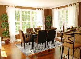 Design of dining room with brown furniture. 30 Rugs That Showcase Their Power Under The Dining Table