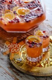 Place one large ice cube in each glass. Holiday Rum Punch Shutterbean Punch Recipes Rum Punch Rum Punch Recipes