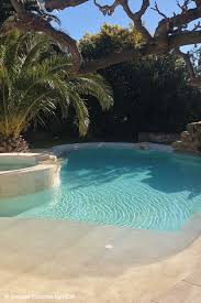 Le Prix D Une Piscine Enterree Budget Tarifs Et Couts Guide Piscine Fr Piscine Lagon Piscine Amenagement Paysager Amenagement Jardin Terrasse Piscine