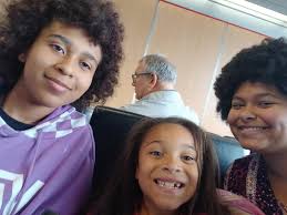 Can someone remove the guys in the background from my photo?