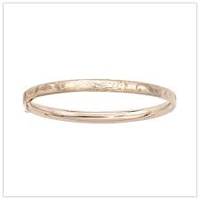 We have simple gold bangles, either with light engraving and carving, or a slight smattering of diamond and gems for comfort. Floral Design Gold Bangle Bracelet 4 5 Inches In 14kt Yellow Gold Gold Baby Bangles