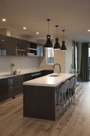Engineered Timber Flooring Runs Throughout The Open Plan Living And Kitchen Acrylic Glass Kitch Kitchen Inspiration Design Kitchen Design Kitchen Inspirations