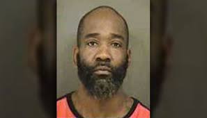 Man wanted for murder after body found in burning car arrested