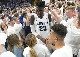 Get the latest news and information for the utah state aggies. Fans Celebrate With Utah State Center Neemias Queta 23 On The Court After Utah State Defeated