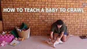 Place your baby on his/her stomach on a carpet on the floor. How To Teach A Baby To Crawl Youtube