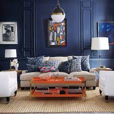 How To Decorate With Orange Without Gagging Blue And Orange Living Room Living Room Color Schemes Living Room Color
