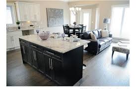 White Shaker Style Cabinets And Dark Island White Kitchen Decor Shaker Style Cabinets White Kitchen Countertops