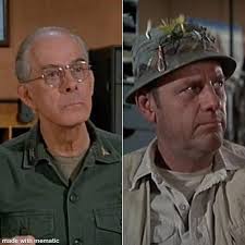 George Hudson and Allen Chapman with a humvee