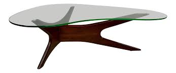 An open shelf provides quick storage for items and is perfect for showcasing items through the glass top. 1960s Mid Century Modern Adrian Pearsall Walnut Glass Top Kidney Shaped Coffee Table Chairish