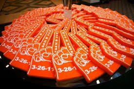 Two Web Belles Lend A Helping Hand Football Wedding Football Wedding Theme Sports Themed Wedding