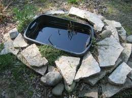 How To Make A Garden Pond With A Rubbermaid Container Ponds For Small Gardens Patio Pond Diy Pond