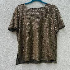 Toni is the tee that will add sparkle to every one of life's moments! Tops Gold Sparkle Shirt Poshmark