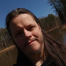 My brother Charles Andrew and me before I tell the drone to fly directly at  us. Took 5 slices to the leg, and broke one sensor